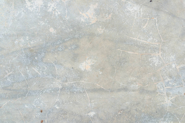 Closeup fragment grunge zvětralé stěně budovy, věku popraskané betonové kamenné omítky zdi textury a pozadí stylu - Fotografie, Obrázek