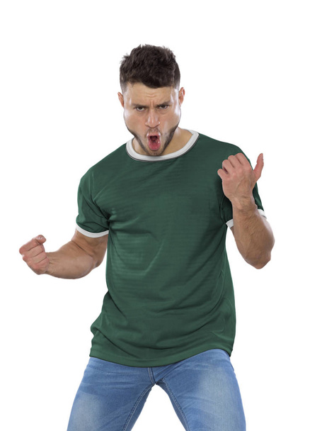 Young soccer fans green shirt creaming with emotion on white background - Foto, Bild