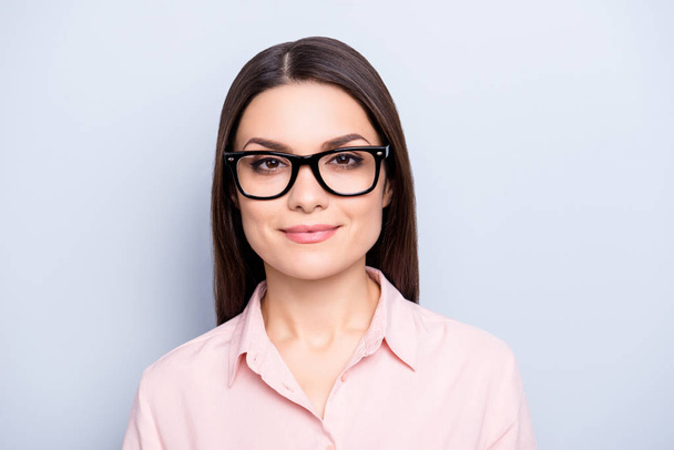 Portrait of clever charming brunette cute pretty woman in glasses, wearing classic shirt, looking at camera, isolated on grey background - Фото, зображення