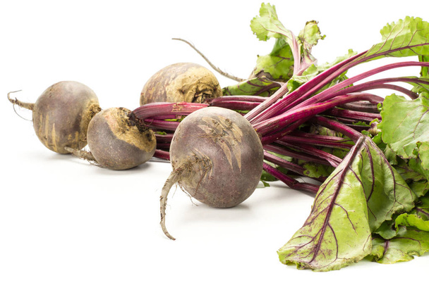 Red beet bundle with fresh greens isolated on white background five bulbs root with leave - Photo, Image