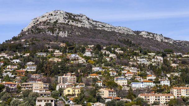 VENCE, FRANCE, on March 8, 2018. A view from the survey platform on picturesque houses on a mountain slope in the neighborhood of the city - Zdjęcie, obraz
