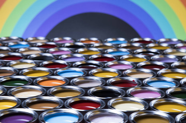 Full Buckets of rainbow colored oil paint - Fotó, kép