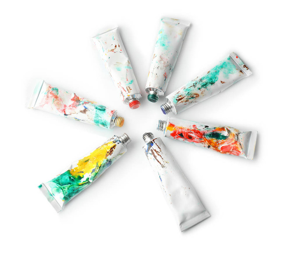Tubos con pinturas de color sobre fondo blanco
 - Foto, Imagen