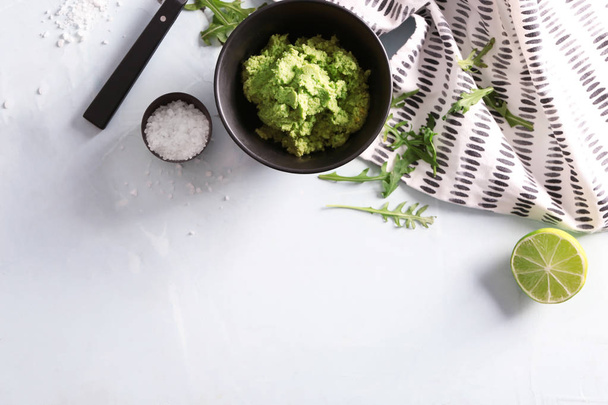 Fresh guacamole in bowl on table - Photo, Image