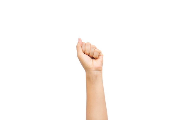 Mano de mujer mostrando puño como signo de papel de roca sobre fondo blanco
 - Foto, imagen