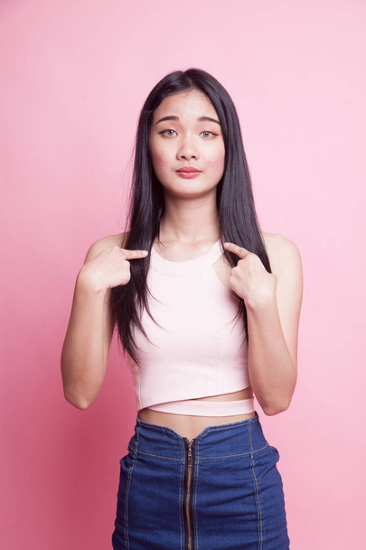 Young Asian woman point at herself ask why me on pink background - Φωτογραφία, εικόνα