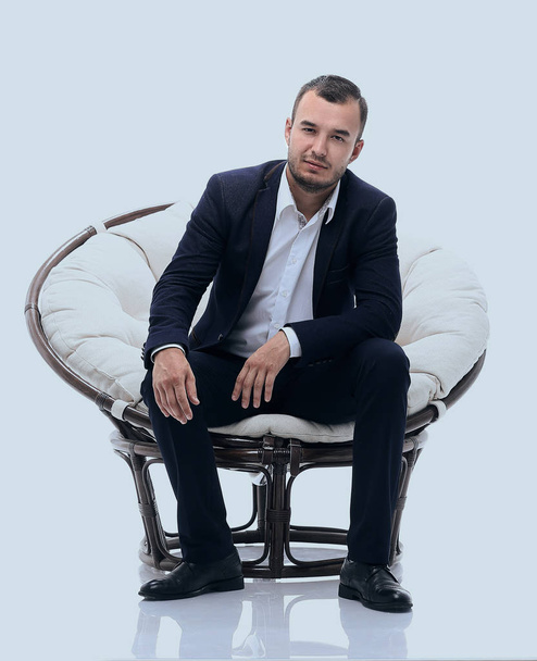 young businessman sitting in a comfortable chair - Fotoğraf, Görsel