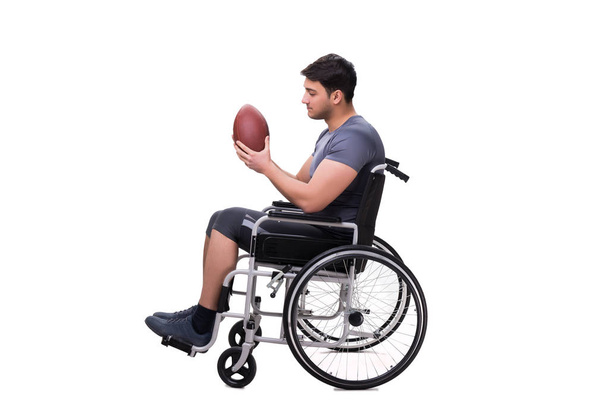 Jugador de fútbol recuperándose de lesiones en silla de ruedas
 - Foto, Imagen