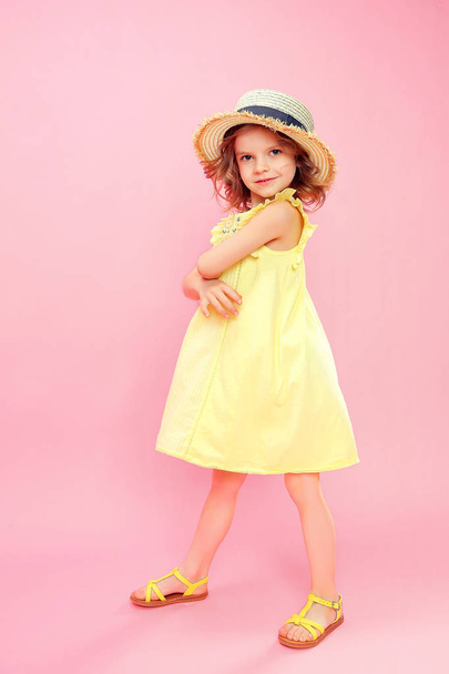 Charming girl in dress on pink - Zdjęcie, obraz