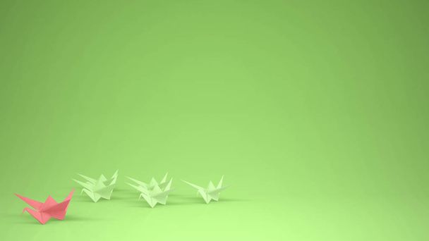Γερανό χαρτί origami ροζ οδηγεί την ομάδα των γερανών, ηγεσία κίνητρο ιδέα με το διάστημα αντίγραφο, πράσινο φόντο - Φωτογραφία, εικόνα