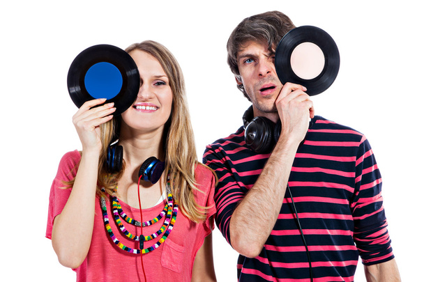 Couple playing around with vinyl records - Photo, Image