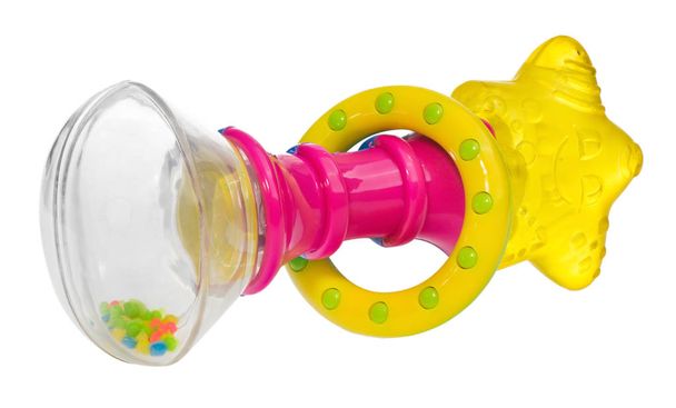 Babyrassel mit sternförmigem Beißring, buntem Reifen und rasselnden Perlen in einem transparenten Gefäß. Kinderspielzeug isoliert auf weißem Hintergrund. - Foto, Bild