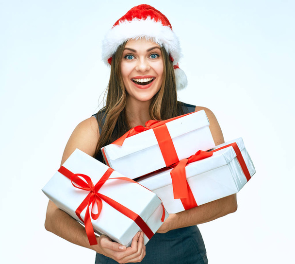 Christmas style portrait of smiling woman holding big pile of presents. Isolated portrait. - Fotografie, Obrázek