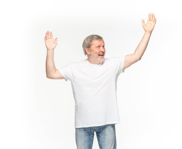Closeup of senior mans body in empty white t-shirt isolated on white background. Mock up for disign concept - Φωτογραφία, εικόνα