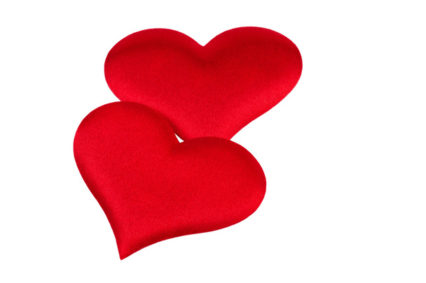 dos corazones rojos aislados sobre fondo blanco
 - Foto, imagen
