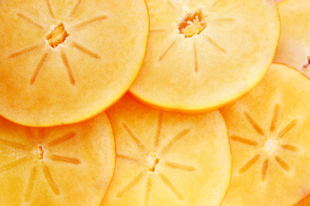 persimmon fruit slices - Фото, изображение