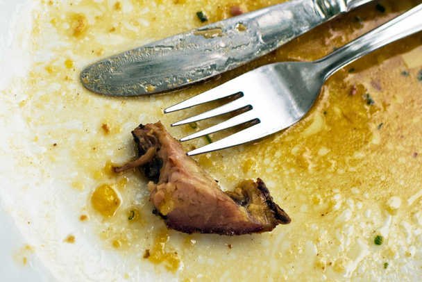 Cutlery after dinner on plate - Фото, зображення