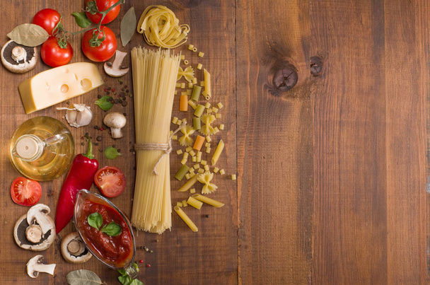  pasta  ingredients on wood background texture - Photo, Image