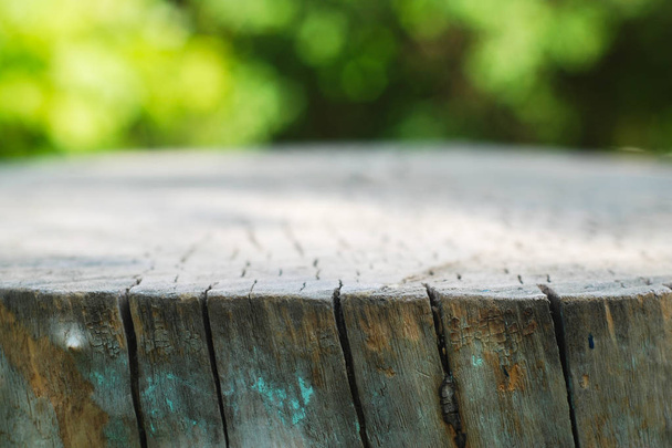 Rustic Wooden Floor Board and Bokeh Blur Summer Garden Background - Foto, Imagen