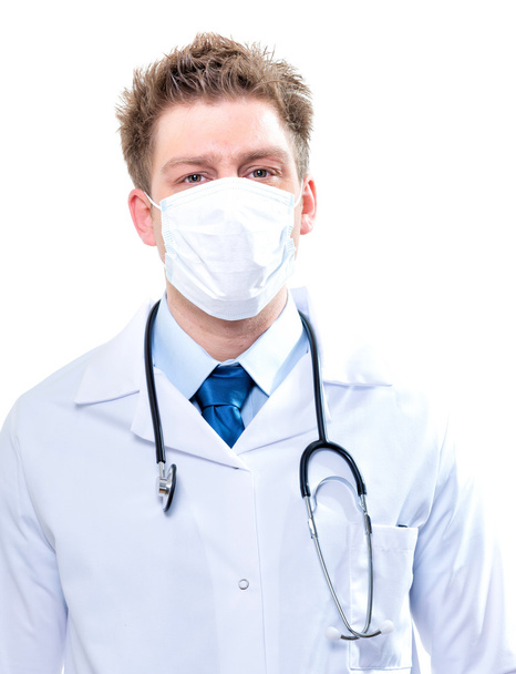 Medical doctor with stethoscope and surgical mask - Photo, image