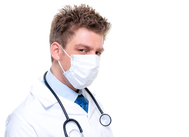 Male nurse or doctor portrait wearing surgical mask - Φωτογραφία, εικόνα