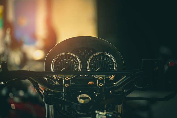 Black screen display of motorcycle miles. Vintage style motorcycle. Tachometer and speed gauges of motorcycle. Speedometer - Photo, image