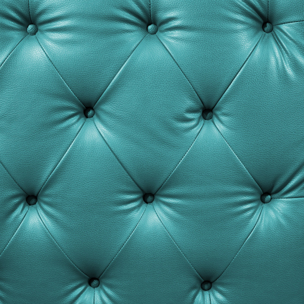 Close up cyan luxury buttoned black leather - Photo, Image