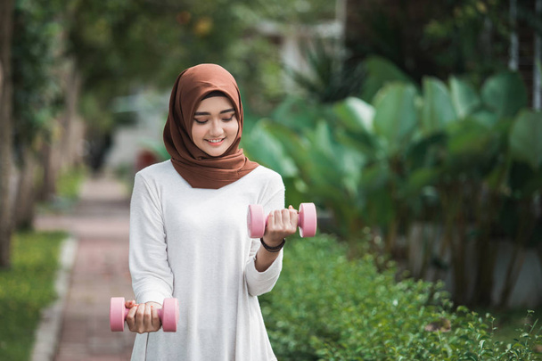 young asian muslim woman exercising outdoor - Fotó, kép