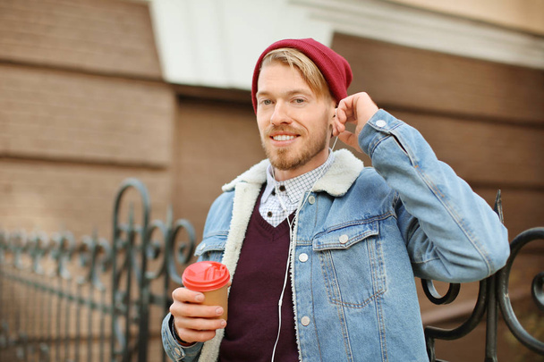 Portrait of hipster drinking coffee - Фото, изображение