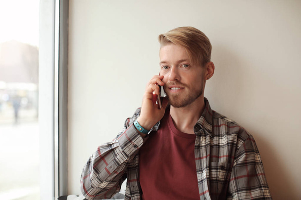 trendy hipster talking on phone - Photo, image