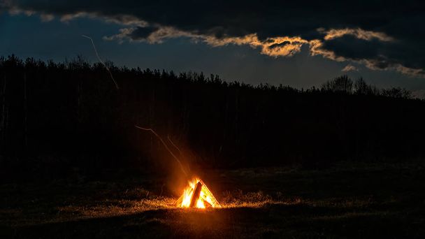 Bonfire at night on the field - Photo, Image