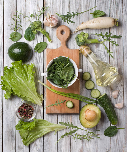 Mix of green vegetables on rustic background - Photo, Image