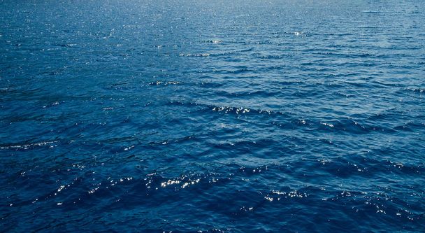 Water in the sea ocean blue waves calm rest comfort outdoor nature aqua background view sunny tropical day - Photo, Image
