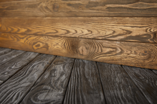 grey wooden striped floor and brown wooden wall - Fotó, kép