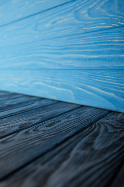 dark blue wooden floor and light blue wooden wall - Foto, imagen