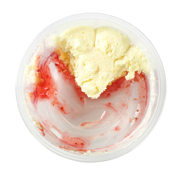 Rest of strawberry shortcake dessert in plastic cup - Photo, Image