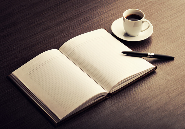 Open a blank white notebook, pen and coffee on the desk - Photo, Image