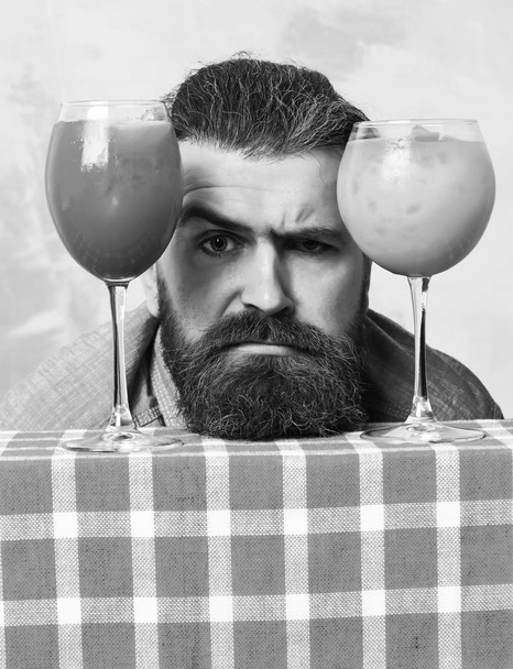 Brutal caucasian hipster with moustache between tropical alcoholic fresh cocktails - Foto, Imagem