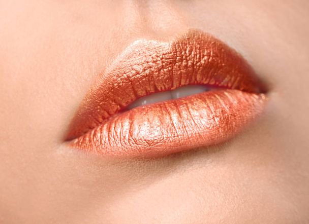 Beautiful young model with creative lips makeup, closeup - Фото, зображення