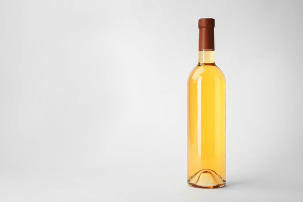Bottle of expensive wine on white background - Fotografie, Obrázek