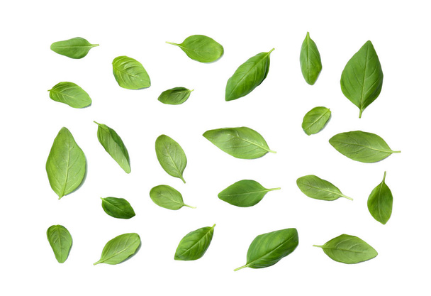 Fresh green basil leaves on white background, top view - Foto, Bild