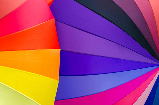 Kleurrijke paraplu achtergrond kleur en kleurenschema 's - Foto, afbeelding
