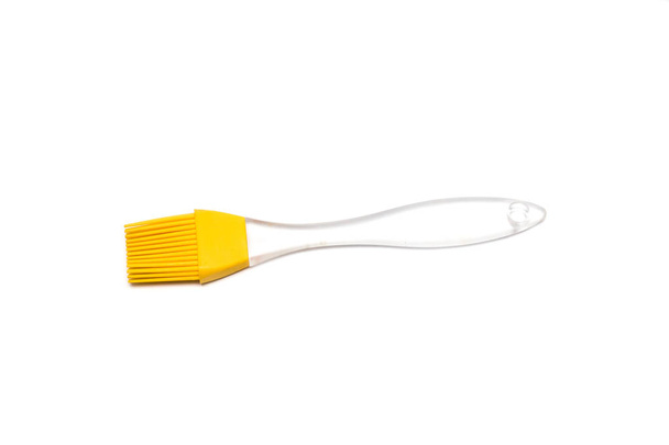 силіконова жовта паличка з прозорою ручкою на білому тлі, ізольована
 - Фото, зображення