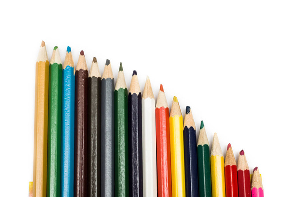 Set of colored pencils in a pile on a white background, isolate - Photo, Image