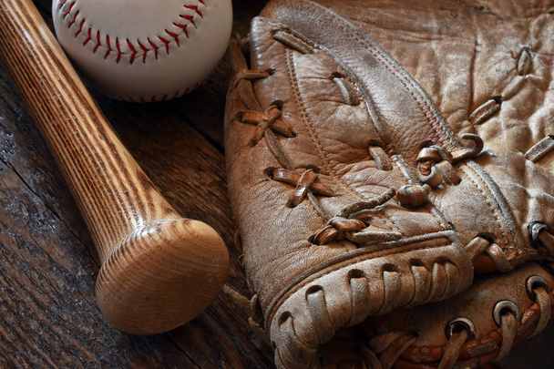 A close up image of old used baseball equipment.  - Foto, Bild