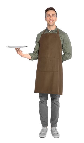 Handsome waiter with empty tray on white background - Foto, immagini