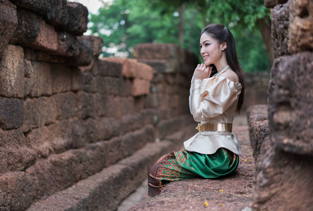 happy beautiful woman in Thai traditional dress  - Photo, image
