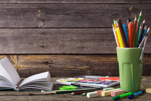 school supplies on a wooden background - Foto, immagini