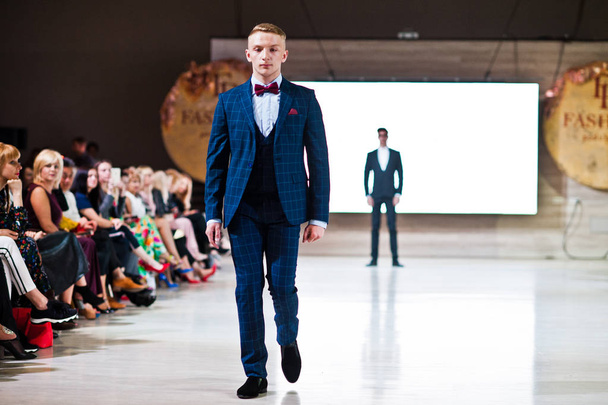Ternopil, Ukraine - May 20, 2018: Podolyany Designers Fashion Week. Models walk runway at Andre Tan man collection Spring/Summer 2018-2019 presentation.  - Zdjęcie, obraz