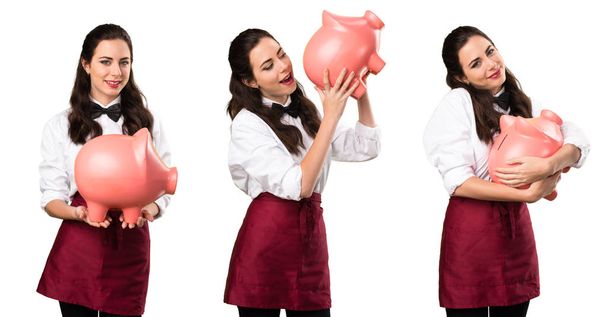 Set of Young beautiful waitress holding a piggybank - Zdjęcie, obraz